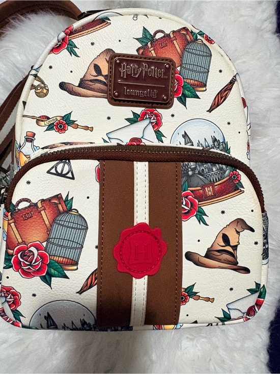 Loungefly Handbags - Loungefly Cream & Brown Harry Potter Mini Backpack with Red Seal
